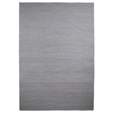Massimo Copenhagen handgewebter Teppich mit Stickrand aus Naturwolle in Grau